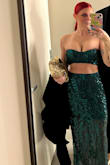 The color was stunning, the fit was a little snug, but in a good way! I wouldn't change the size I picked! I am larger chested, and the top didn't budge, even while dancing! - Rose R.