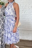 I read all the reviews and ordered a small when I normally wear a medium. So glad I did this because it fit perfectly. I could tell a medium would have been far too large. I got so many compliments on this dress and how elegant it was. It was perfect for this bridal shower theme (something blue). I look forward to wearing this dress again, it is perfect for spring and summer, it flows and breathes and the neck area wasn't too tight for me. I did need help with the buttons though. I could've gotten them myself, but it was easier with help lol. - Katie B.