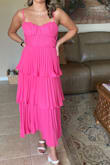 Comfortable. It was dressy nice material. Many compliments. No bra needed. Bunched up in the back a little - Allison C.