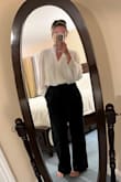 This top is beautiful and flattering. It's lined and not too low cut - wore it to work with no worries. I received sooooo many compliments. I haven't washed it yet but plan to do cold on delicate and hang dry. So glad I bought this! - Caitlin R.