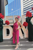 I wore this dress to a Derby event, and I was absolutely in love with the low cut back, the gorgeous material, and the color of the dress. I got lots of compliments! However, how it fit on my body was kind of... ehhh... to be honest, the day was saved with some hollywood double sided breast tape. I did a trial to see where I should tape, and then on the day of my event, I retaped those areas. It did last all day and felt very comfortable and looked great! Not sure if it was just my bust size or what, since the bottom fit perfectly, but the top was very loose and required lots of tape to make it fit to my body! Another really awesome added bonus is this material dries VERY quickly with NO stains - I had a drink spilled on my dress, and an hour later, you couldn't even tell!! - Mercy H.