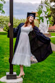 This dress worked beautifully for college graduation. It was made well and seemed true to size. The bust area is made for smaller-chested women, but I made it work. - Janelle G.