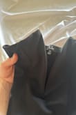 The v part of the shirt is a metal wire. I washed the shirt once and the metal wire (on both sides) popped out. It's pretty cheap looking in person. I would've returned it but the return window closed. Not great quality. I do not recommend. - Jilan W.