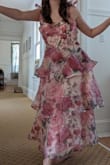 This dress is quite flattering and I think it looks great on me. That said - it runs small. I ordered a Large and it fits really well (I am not a large - I'm a medium) so go one size up. It also has no stretch due to the fabric, although I did have some space in the torso since I have a small bust. For the length, it ends mid calf on the model since obviously they are super tall but on me it ended right around the ankle. Also, as with all Lulus dresses the zipper in the back is EXTREMELY poor quality and gets stuck at the seam so I will have to probably get it replaced eventually or fix it myself. - Casey N.