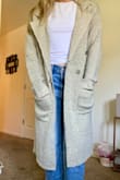 I absolutely adore this coat!! The material is so soft and warm, and it's not too heavy which is great for living in the south. It kept me warm without overheating me, so I give it a 10/10! It also layers very well with other winter apparel. - Emma P.