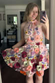 There is kind of a weird flower poking out on the collar and some of them don't feel fully secured down but nothing that can't be easily fixed. This dress is super cute and it does feel really nice. - Allison Y.