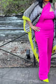 This jumpsuit was perfect for a spring wedding at the botanical gardens. Easy to get on and off and for bathroom use LOL. I had to get the legs shorten a little because I'm short, I knew that when buying it. Comfy and the material is soft and stretchy. I danced all night with no problem. 100% recommend. - Joanna C.