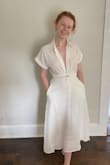 I was nervous about the sizing but I'm happy I went with XS because I think small would've been too long. It hits mid shin and the dress has great movement. I wore a sticky bra because the top is sheer but otherwise it's very classic, versatile, light and airy! - Maureen F.