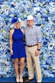 I ordered and wore a medium but I could have been just as comfortable in a small. I was too worried the small may have been too short, though - so kept the medium. The dress is forgiving. It's adorable, bright, and flattering. The ruffles give it just enough of a flirty look. I went simple with white hat, earrings & nude pumps. The morning was slightly chilly so I had a white pashmina that also made it look chic. I received a ton of compliments. - Rachel W.