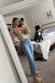 I absolutely love this top. Gorgeous in person, I got so many compliments on it. True to size Im a small but the fabric has no give to get on and off easily, kinda have to shimmy it on and off but overall love it. - Gabrielle S.