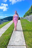This dress fit like a glove! The rushing camouflaged any tummy insecurities I had and made me feel so secure, Also the bright colors were stunning! - Tristy S.