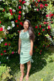 I love the color of the dress. With the drawstring, you can adjust the length of the dress. It's comfortable and has a little stretch. - Ava P.