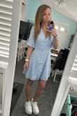 This dress is so cute! I said it runs large as it was hanging off me a bit in a baggy way. I don't have much of a bust so much more room lol. 
When sitting, the buttons in the same area of the tie seem to spread so you can see in, no matter how loose the tie is. Standing - no issue. So it's just managing that which isn't horrible. I wore this for Mother's Day for afternoon tea and plan on wearing it to work! - Melissa L.