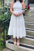 This dress was light and flowy but not see through. It was perfect for a college graduation. It ended right in the middle of my calves which was perfect - Heather B.
