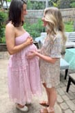 I wore this for a baby shower and loved how cute and comfy I felt! I will say I looked like maybe I was hiding a baby bump in some of the pics, so just be aware of how you pose lol. That being said, could be great space for a baby bump ;) - Bree Z.