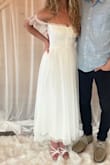 Loved this dress for my bridal shower! The only thing is that the straps were a little tight/uncomfortable to wear around my shoulders or off the shoulder. But got so many compliments! - Kelsey R.