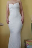 I am from Finland, measuring 168cm and about 75kg, pear-shaped. This dress hugs me like a glove. Size L is just perfect, the top area can be sized right with the straps and the hip area fits perfectly since the fabric has a lot of elasticity.
Quality is fine, some dangling threads but I can cut them before the event. I will anyway take the dress to be modified since I don't want it to be that long. - Minna K.