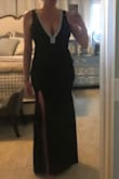 This dress is absolutely beautiful! I received so many compliments! The fabric quality was superb, especially for the price, and the fit was absolutely perfect. I am much taller than most, so finding a dress that is long enough can be tough - but this one was just right, even with heels! It is form-fitting, so if you are worried about areas like the stomach, it may not be right for you; however, with the black color, I do not think it would be overly noticeable, and I am sure that there are some spanx-like options that would help, too. The slit does come up pretty high, but not too high, in my opinion. You cannot beat the fit and quality of this dress for the price! Even the rhinestones were great quality, which I was pleasantly surprised about after initially being worried that they would look cheap... but they certainly didn't! Highly recommend! - Ashlee E.