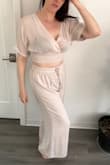 Great cover up after a day at the beach or pool, and want to head out for a bite to eat. The top is more sheer than the bottoms which are lined. I love the light breathable fabric. The waistband is thick and very elastic. Almost has a cinching effect and isn't too tight. Drawstrings are cute with little tasseled ends. I'm looking forward to pairing this outfit with some heels, hair up and hoop earrings for a seaside dinner outdoors on a hot summer evening! - Carol M.