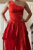 I got an XS, but my hips are wider, so the bottom of the fitted part sits higher and reduces the size of the cutout (which I kind of expected). It does wrinkle easily. I'm 5'3/5'4" tall and the bottom of the dress falls about an inch above the ground barefoot (but also in part to it sitting higher on me). The color is spot on. Overall I love this dress! - Hunter H.