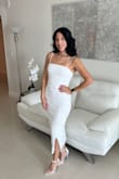 Fits perfect. Not too tight. Just perfect. I didn't get hot in it and got so many compliments. It's a beautiful must-have. - Lorena C.