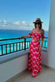 Great color. The top is a little stretchy which allowed me to wear a strapless bra. Skirt hit right above the hips and was a light flowy material - perfect for Mexico! - Jennie C.
