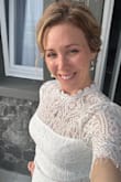 I bought this dress to wear on a vacation with my husband - we celebrated our 10th Anniversary!  I wanted to get something that looked wedding-esque but not too formal at the same time.  I loved the length of the dress, the sleeves, and the neckline.  All of it!  It wasn't too tight or too loose.  I wore a strapless bra and did just fine in it.  If this dress were in another color, it would be a perfect date night or wedding guest dress!   I'd probably buy it! - Kelly M.