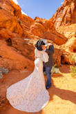 The dress was perfect for our wedding! I had it altered, mostly in length (both at the bottom and sleeves) because I'm quite short. The material was great, and I got so many compliments on this dress! - Katy B.