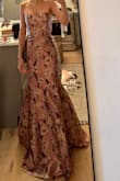 Perfect fit, very dressy, double lined. Nice material with a shiny finish; floor length with room for a high heel. I'm only not giving 5 stars since the color washes me out slightly with a tan - Rachel R.