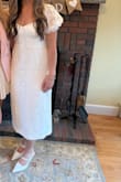 I wore this dress to my engagement party and absolutely loved it! Got so many compliments. True to size. Obsessed with the back of it and and the puffy sleeves. Highly recommend. - Kate M.