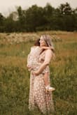 Absolutely loved this dress! I got it for my pregnancy announcement photo shoot! I'm pretty short so it wasn't too long and that was my main concern, but it was perfect! - Sierra H.