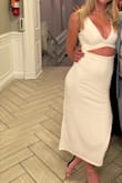This dress fit perfectly. Material is thick. Not see-through. Very flattering. I'm 5'5" and 119 pounds. I ordered an xs. - Stephanie L.