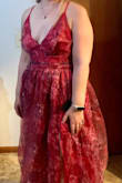 I bought this dress for my brother's wedding, a destination wedding in the summer. The colors are so bright that I did as other people recommended, and I sized up to a Large. It is long, so I probably need to trim the end, but it is perfect for the occasion. - Xiomarie A.