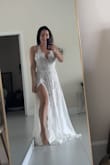 This dress is The Perfect dress for my beach wedding! If fits perfectly in the midsection-I did get it shortened, and had the straps tightened as well to fit my shortness better yet otherwise it's awesome! (Pic is before the alterations). The material is great, it's flowy, not hot, and will be sooo perfect for my day! I'm super pumped! - Christina P.