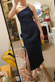 It looks like a toga when straps are worn both to one side and kind of silly (but better) when straps worn to either side like the model. It's nice that they're adjustable but doesn't fix the issue that the dress isn't that flattering by itself. You may need to accessorize with some kind of shawl and be pinned at the waist. - Heather M.