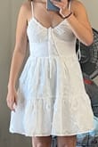 Fit is perfect - was concerned at first because the top was huge but you just have to pull the strings to tighten it. So cute! Length is great - not too short! - Amber M.