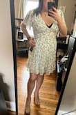 Bought this for my engagement shoot. It's perfect but just so tight under the chest that I can barely breathe. I was able to zip it up fine but am worried about busting a seam. I usually fit between L and XL so I'm surprised this XL is so tight. I purchased some shapewear to try to ease the tightness. It's also a bit low cut so you may need to wear a plunge bra or sticky cups so the bra doesn't show. Hopefully, all works out well for the photoshoot! - Lynn M.