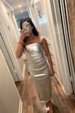 If you are curvy, this fits AMAZING. Very flattering. It hugs your waste line. It's tight but it stretches and is breathable! I love this dress so much. Can't wait to wear it! - Paige S.