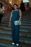 This jumpsuit was the perfect blend of style and comfort for attending a fashion event at The MET. I had a bit of trouble zipping it past the midpoint in the back, but I was able to get it eventually. I paired it with some clean white sneakers since I had to walk around a museum, but it also looks great with heels. I got lovely compliments on the green color as well. I'd highly recommend this look if you're not in the mood to wear a dress. - Sable W.
