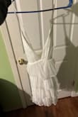 This dress was so so perfect for graduation! It fit perfect and looked so cute under my gown! - Allie D.