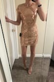 This is a pretty dress but the sequins already started falling off when I tried it on. I also had it on for 5 minutes and the sleeves left a mark on my arm from how itchy the stitching was. - Mia R.