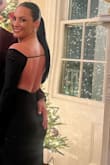 I wore this for a New Year's Eve wedding and it was absolutely stunning! I got compliments all night. Looks great with a slicked back pony so you can show off the back of the dress. No bra was needed and I'm a 36C. Runs true to size. I did have to get it hemmed about an inch but it fit perfectly! Such a flattering dress. - Meagan M.