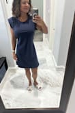 I love this dress! The shoulder pads are just enough to dress it up (if you want to), but they're not too much! It fits true to size and I love the crop feeling in the back. - Elena W.
