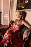 I love this dress, bought it in red and just ordered black one. Very lightweight, comfortable, breezy, perfect without the bra. - Indre S.