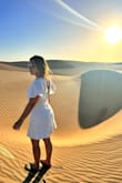 The dress is made of thread, soft white, it does not blind the eye, it is not transparent. It was perfect for my vacation in the desert. - Daymara E.