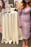 This dress was very flattering. The quality was ok but overall, I really liked it. It was very comfortable and the sleeves stayed up. I think my curves stood out a little, but it was still very nice. - Asbasia M.
