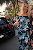 This dress is so comfortable and a showstopper. It is comfortable and packs well. Flattering and flowy... All my photos appear too small, except this blurry one. Sorry! - Kathrine G.