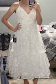 I got so many compliments on this dress I bought for our wedding shower.  My soon to be husband loved it as well. Fit perfectly. A little long on me, but I'm very short so its understandable. My only complaint is the material on the outside is a little rough, but the inside is lined nice so you don't feel it. - Emma A.