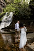 I bought this dress for my ceremony and it was perfect for my waterfall wedding. The fit was true to size. It wasn' see through at all, and hung perfectly off the shoulder! - Aleshia T.