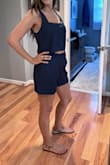 It's a beautiful, thin, high waisted short that has pleats in the right places to cover a lower stomach pouch, but unfortunately it didn't look right on me because I am too wide on the bottom. The whole look would probably look great on most figures just not super curvy ones like myself. I would say if you want to give it a try size up for the bottom and your regular size for the top. - Marline K.